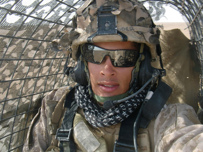 Photo of Marine Corps veteran Wade Risha in camouflaged uniform