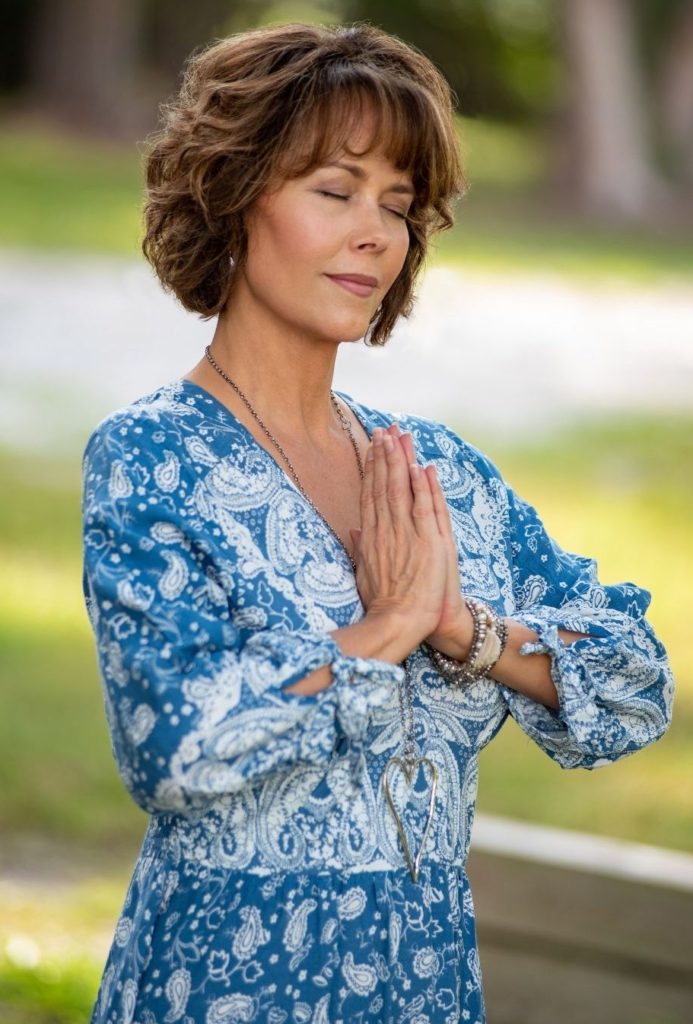 Photo of Darlene Coleman with praying hands